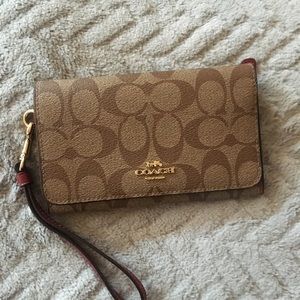 Coach Women’s tech flap wallet